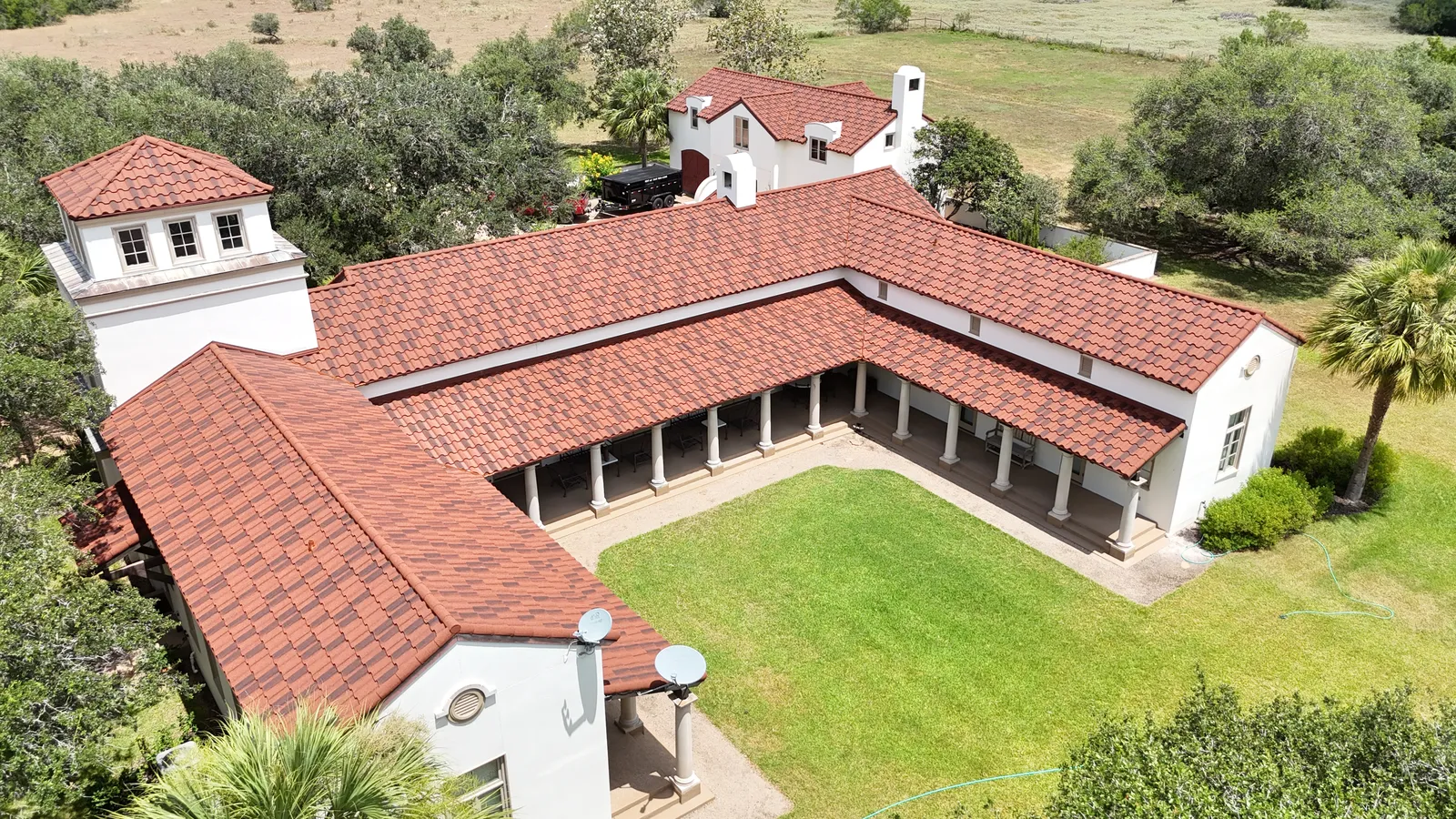 Stone coated steel DECRA roof by RISE Roofing Houston — aerial view 3