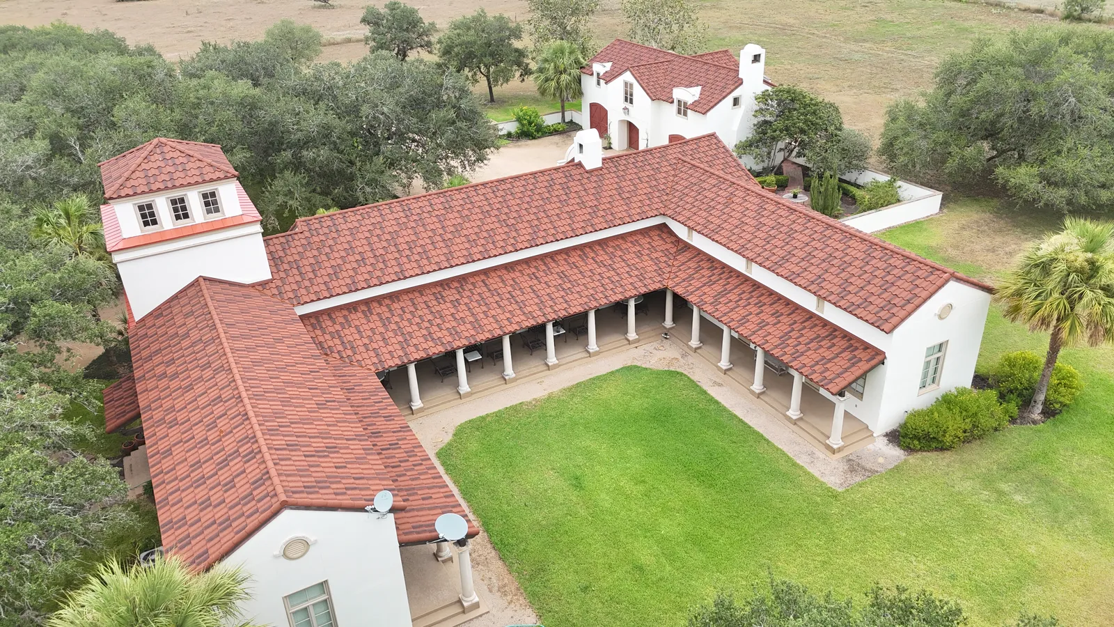Completed DECRA Villa Tile roof in Rustico Clay — aerial view 6